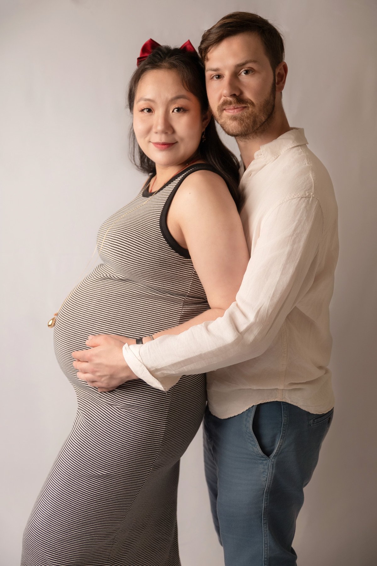 photographe grossesse couple Lyon — séance maternité haut de gamme